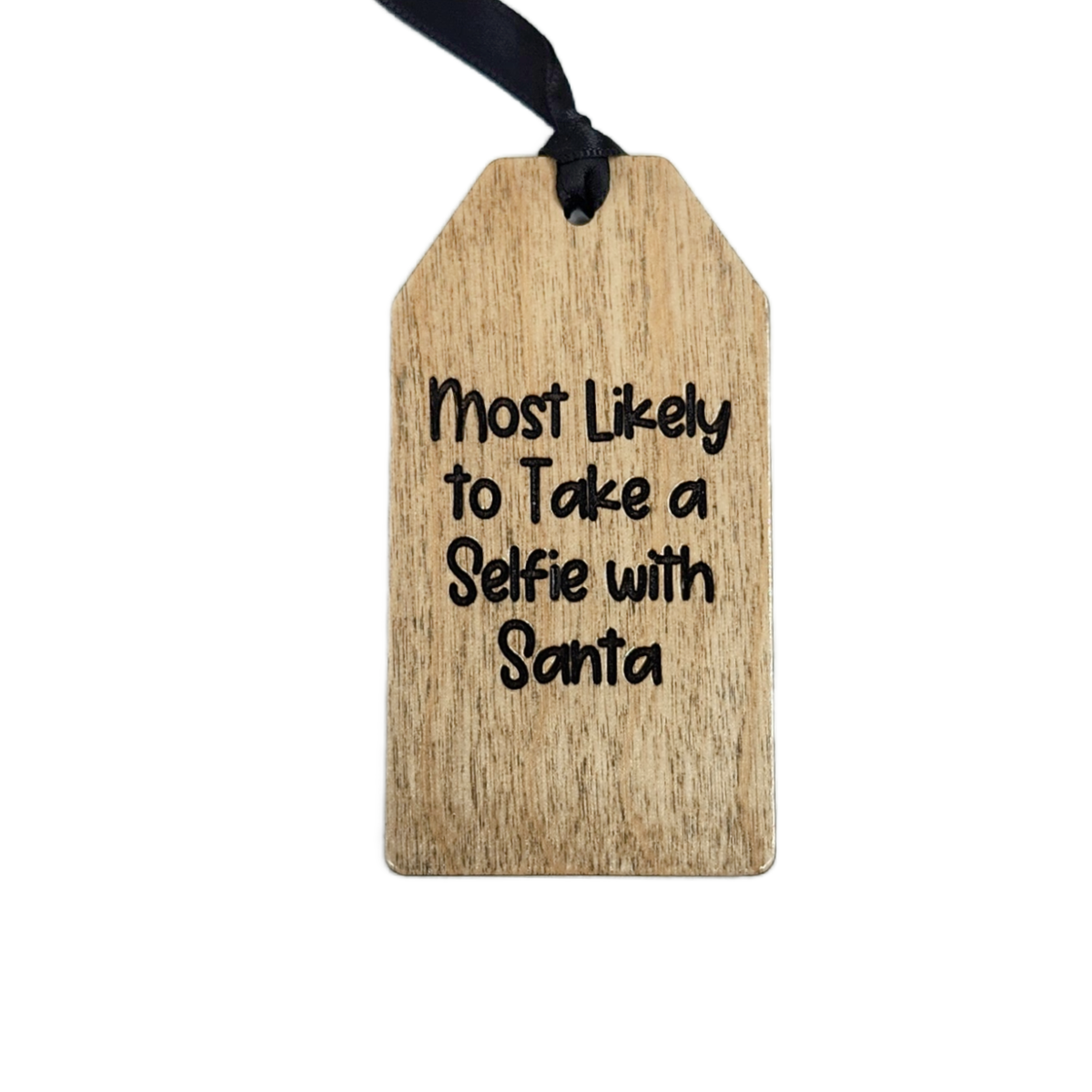 Wooden tag with black text 'Most Likely to Take a Selfie with Santa' on a white background